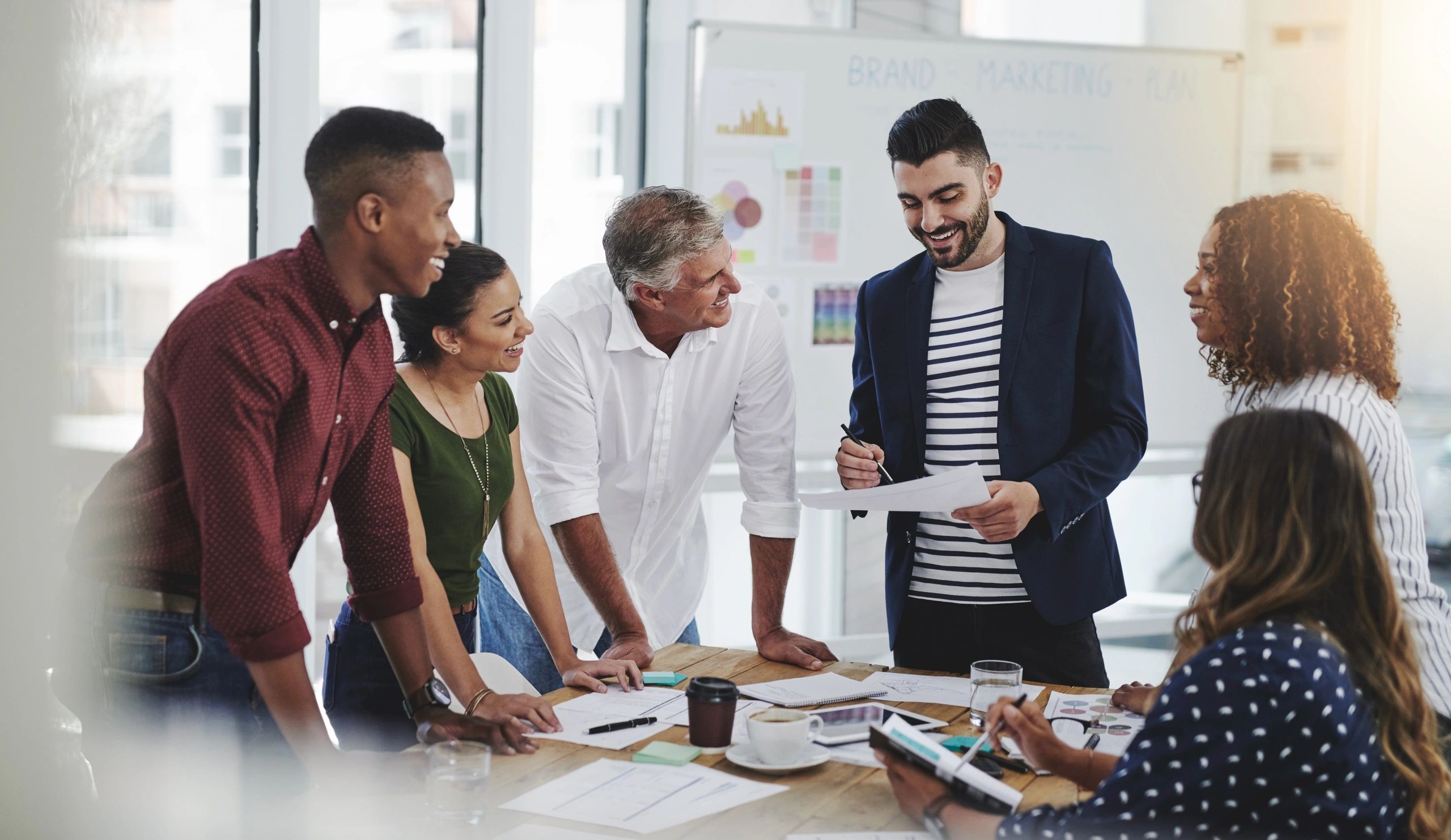 Creative agency team working together in a modern office
